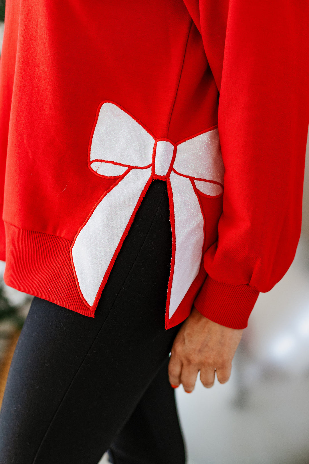 MERRY BOW SWEATSHIRT