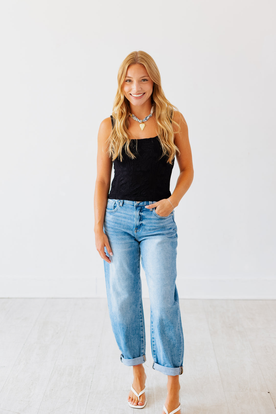 RISEN: HIGH RISE MEDIUM DENIM MILD BARREL JEAN