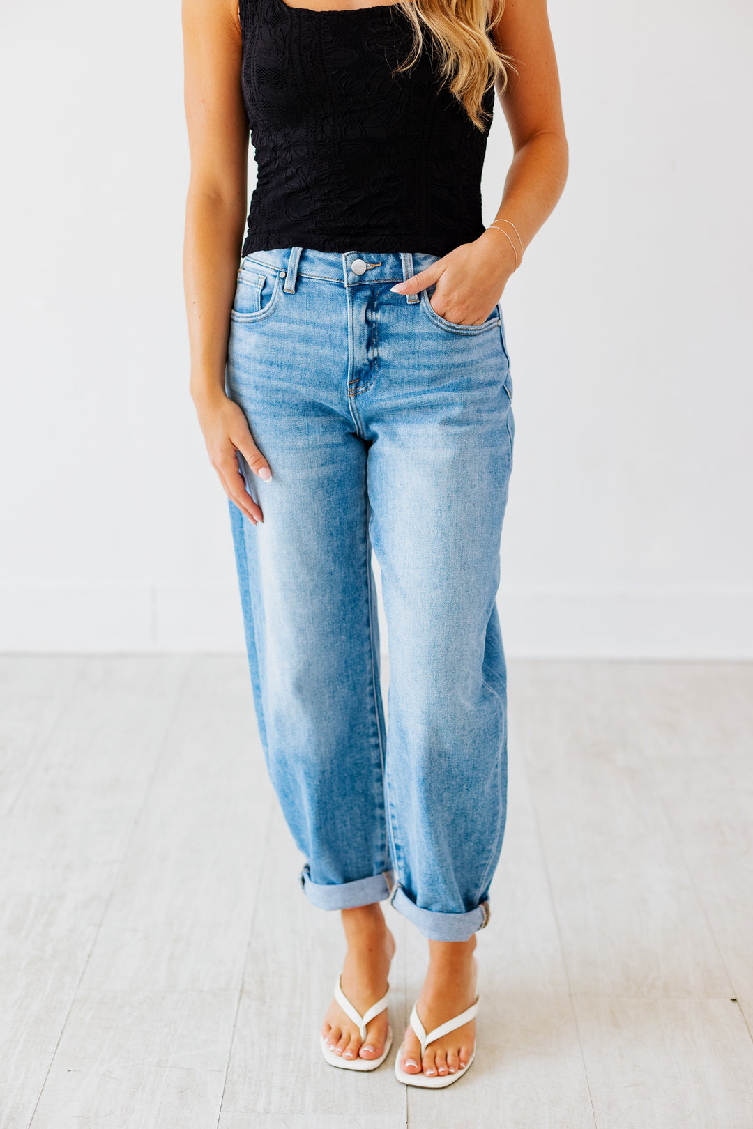RISEN: HIGH RISE MEDIUM DENIM MILD BARREL JEAN