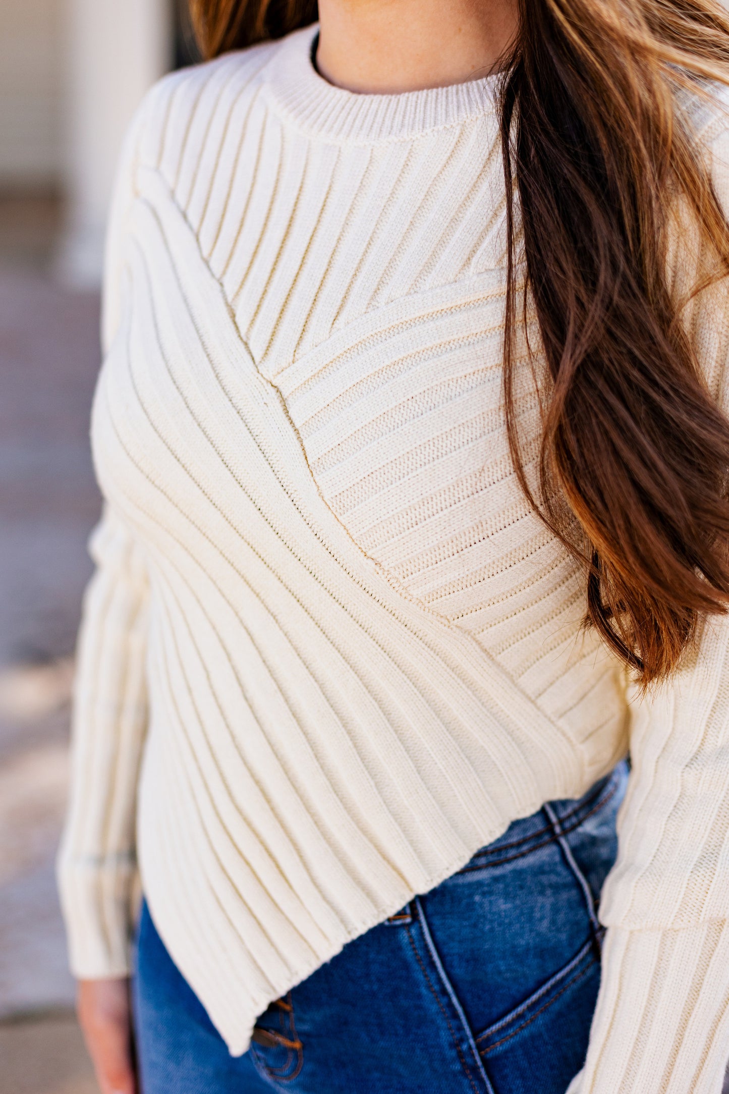 MAIN CHARACTER ASSYMETRICAL HEM SWEATER
