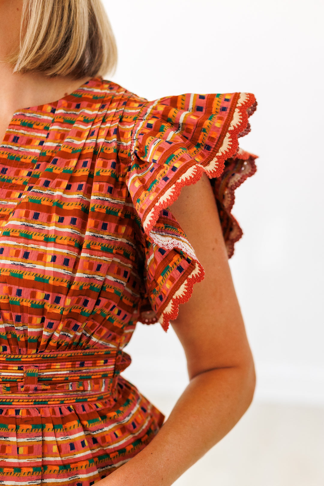 TERRACOTTA MULTI FLUTTER SLEEVE TOP