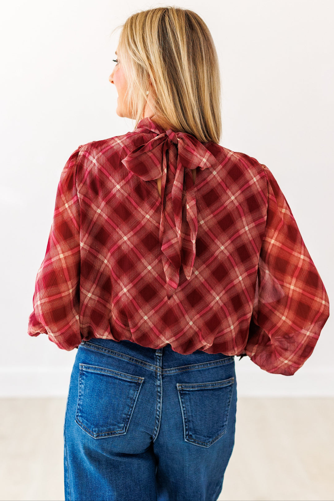 MERLOT PLAID BUBBLE HEM BLOUSE