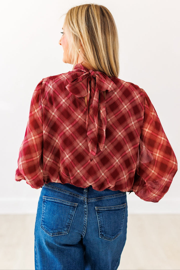 MERLOT PLAID BUBBLE HEM BLOUSE