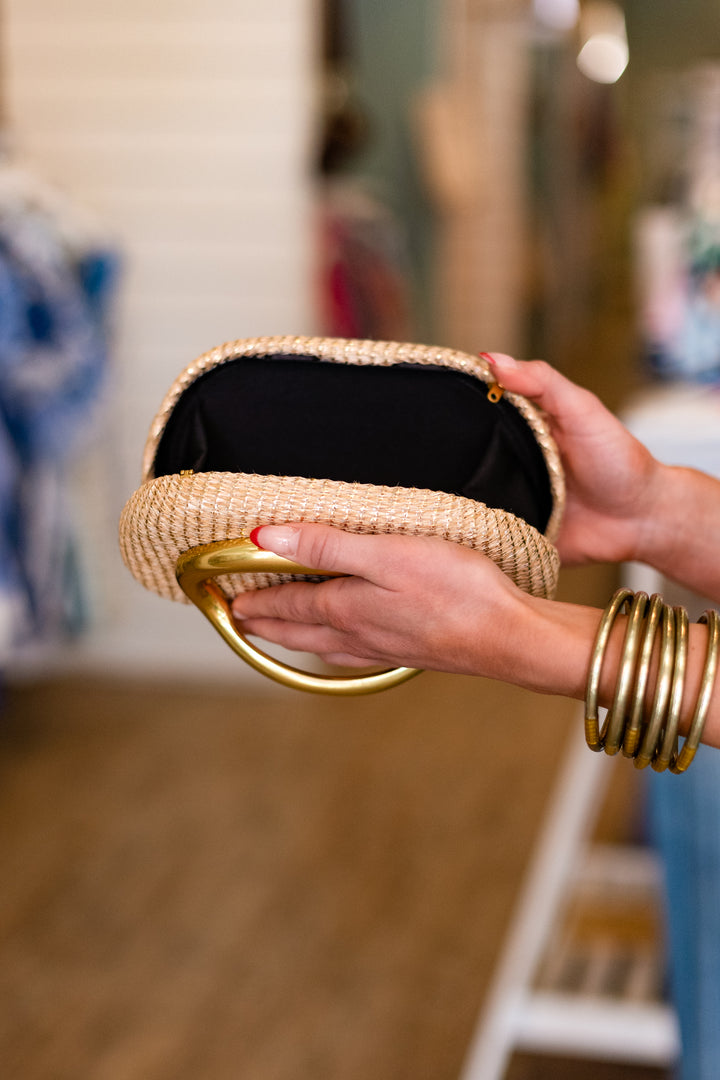 ABSTRACT GOLD HANDLE CLUTCH