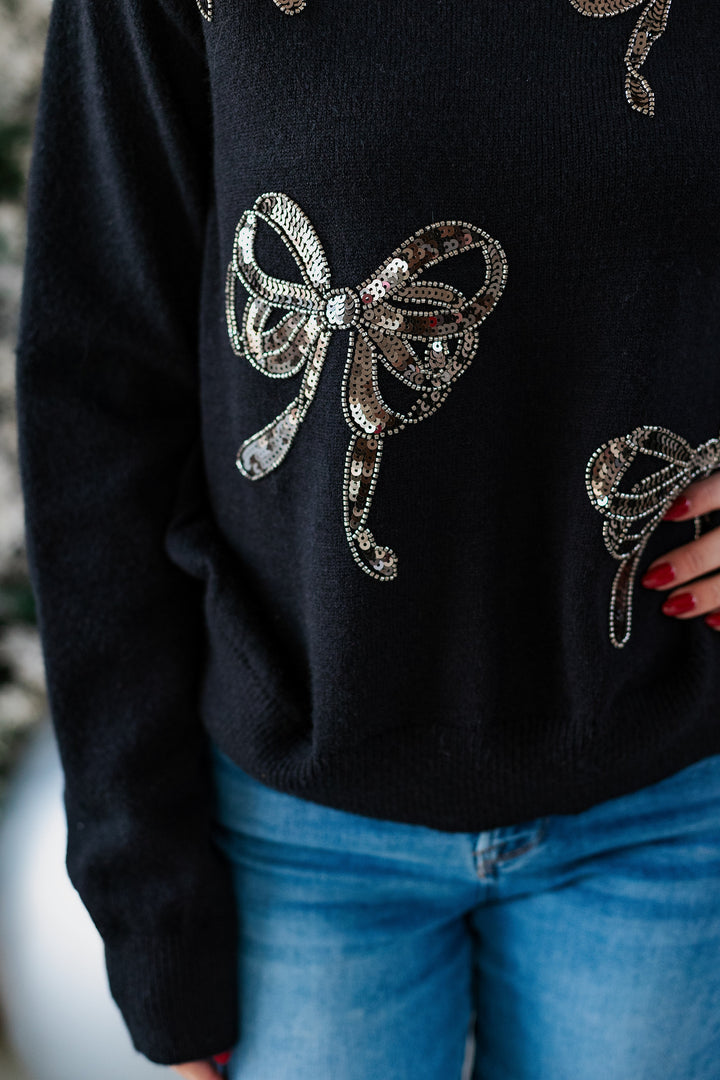 BLACK SEQUIN BOW SWEATER