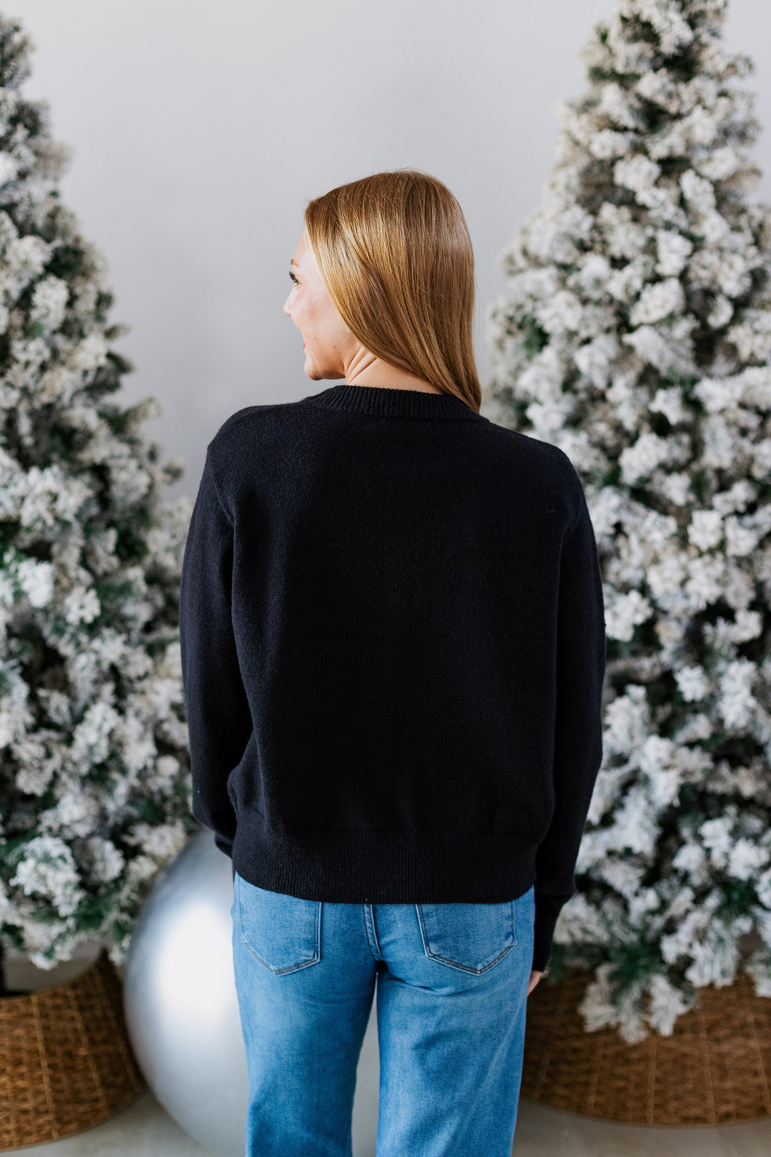 BLACK SEQUIN BOW SWEATER
