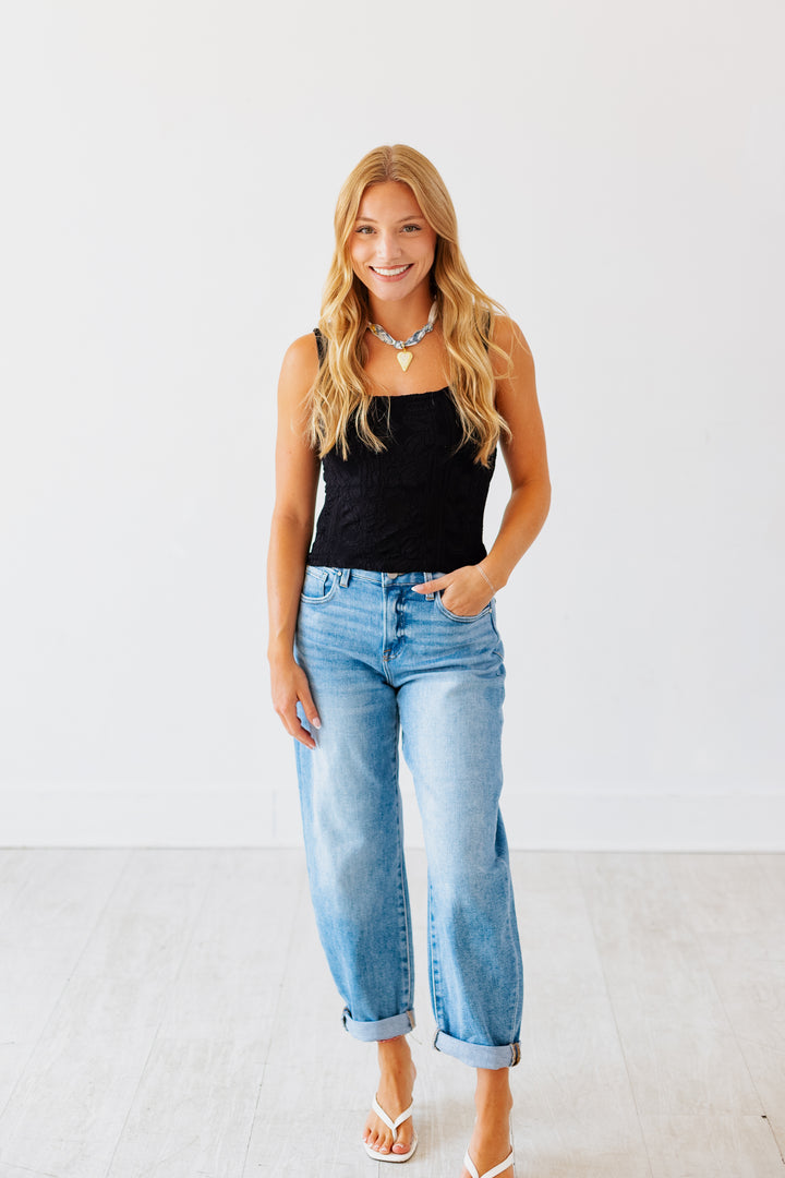 RISEN: HIGH RISE MEDIUM DENIM MILD BARREL JEAN
