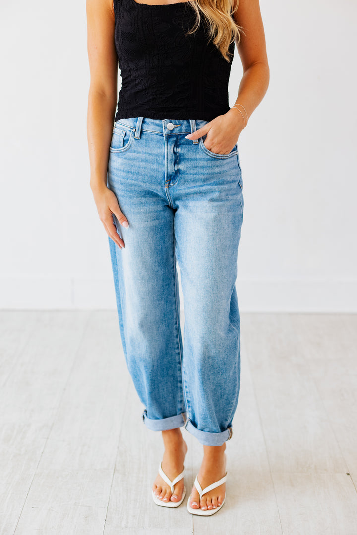 RISEN: HIGH RISE MEDIUM DENIM MILD BARREL JEAN