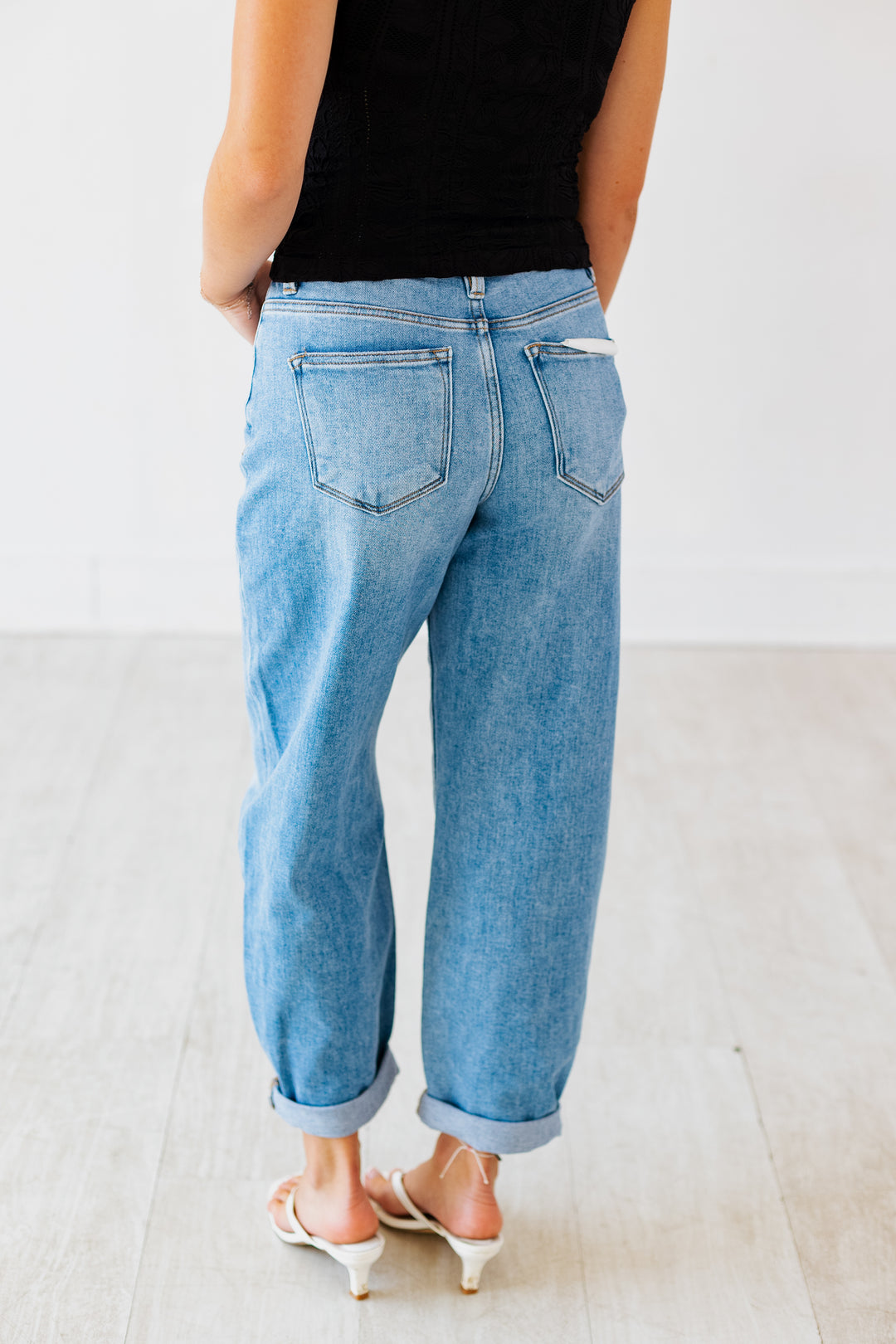RISEN: HIGH RISE MEDIUM DENIM MILD BARREL JEAN