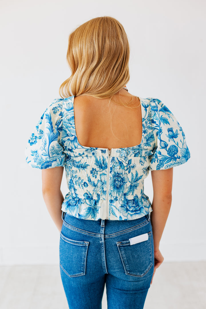 BLUE SKIES FLORAL SMOCK TOP