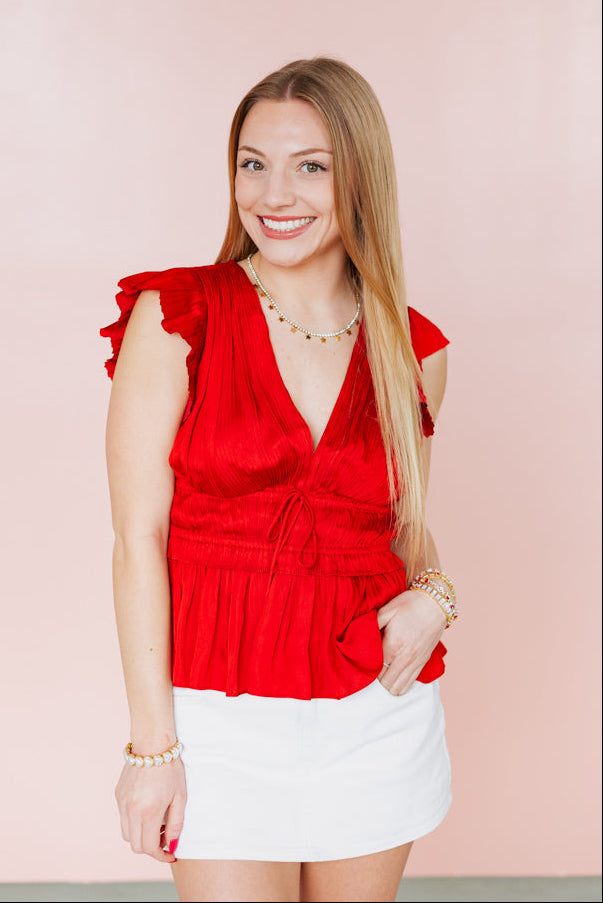 RIVETING RED PLEATED SILK TOP