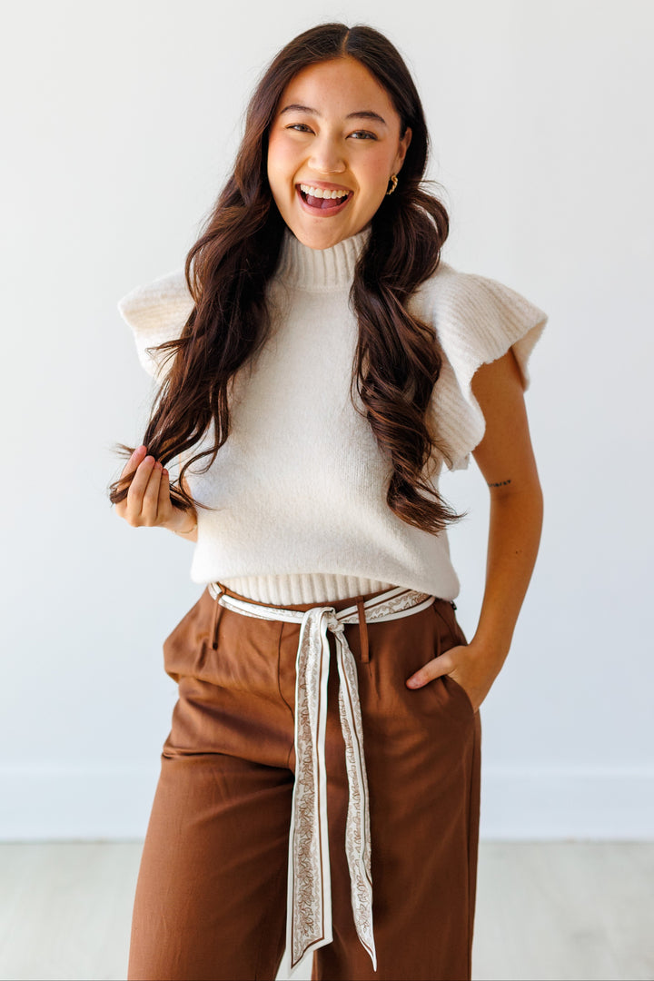 RUFFLE TRIM SLEEVELESS SWEATER - CREAM