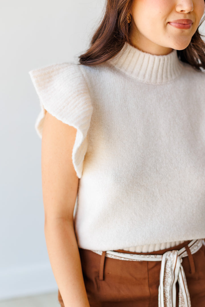 RUFFLE TRIM SLEEVELESS SWEATER - CREAM