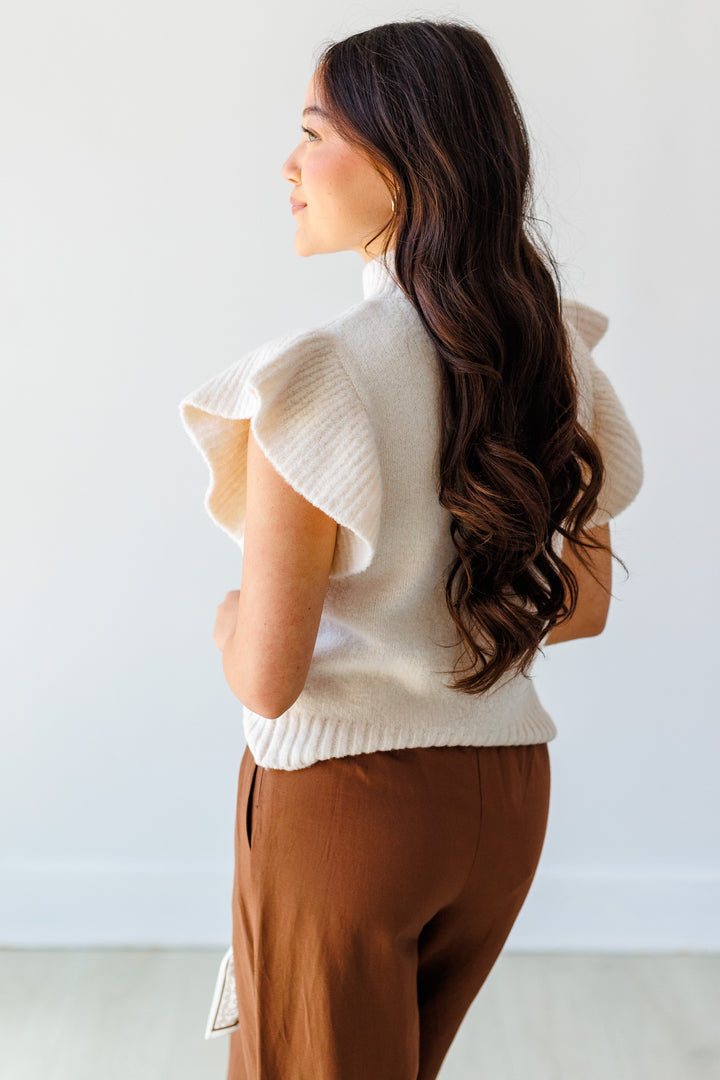 RUFFLE TRIM SLEEVELESS SWEATER - CREAM