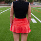 WASHED RED WRAP MINI SKORT