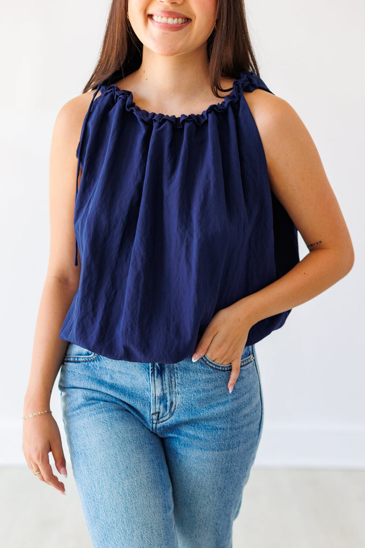 NAVY BUBBLE HEM TOP