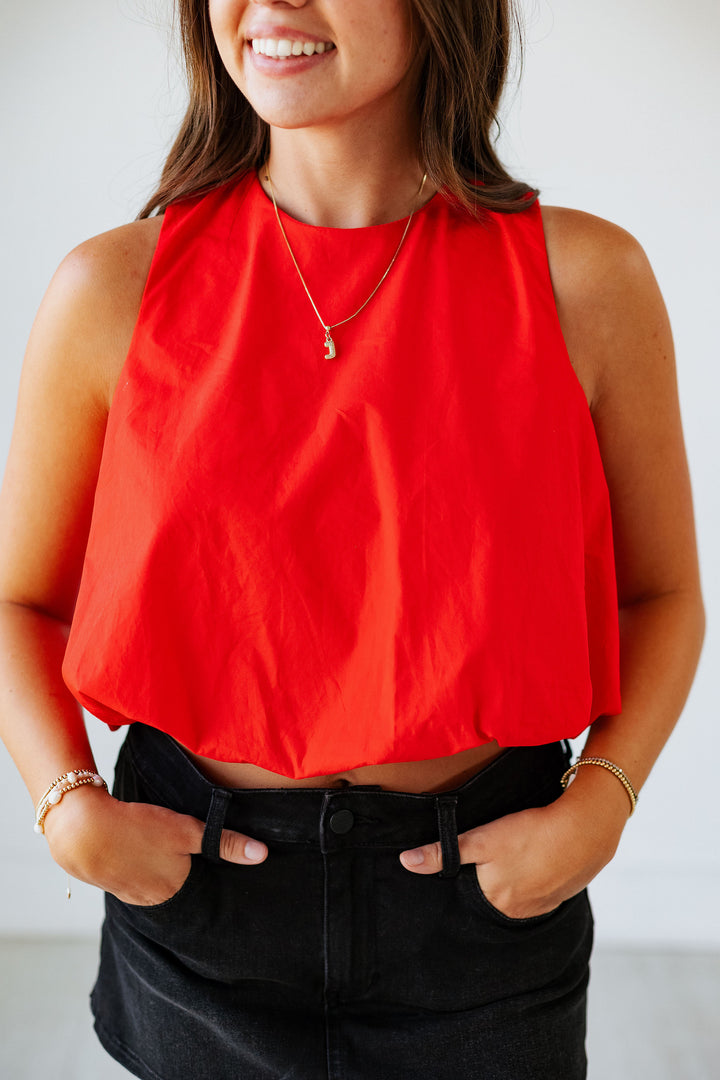 RED POPLIN BUBBLE HEM TOP