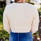 MAIN CHARACTER ASSYMETRICAL HEM SWEATER