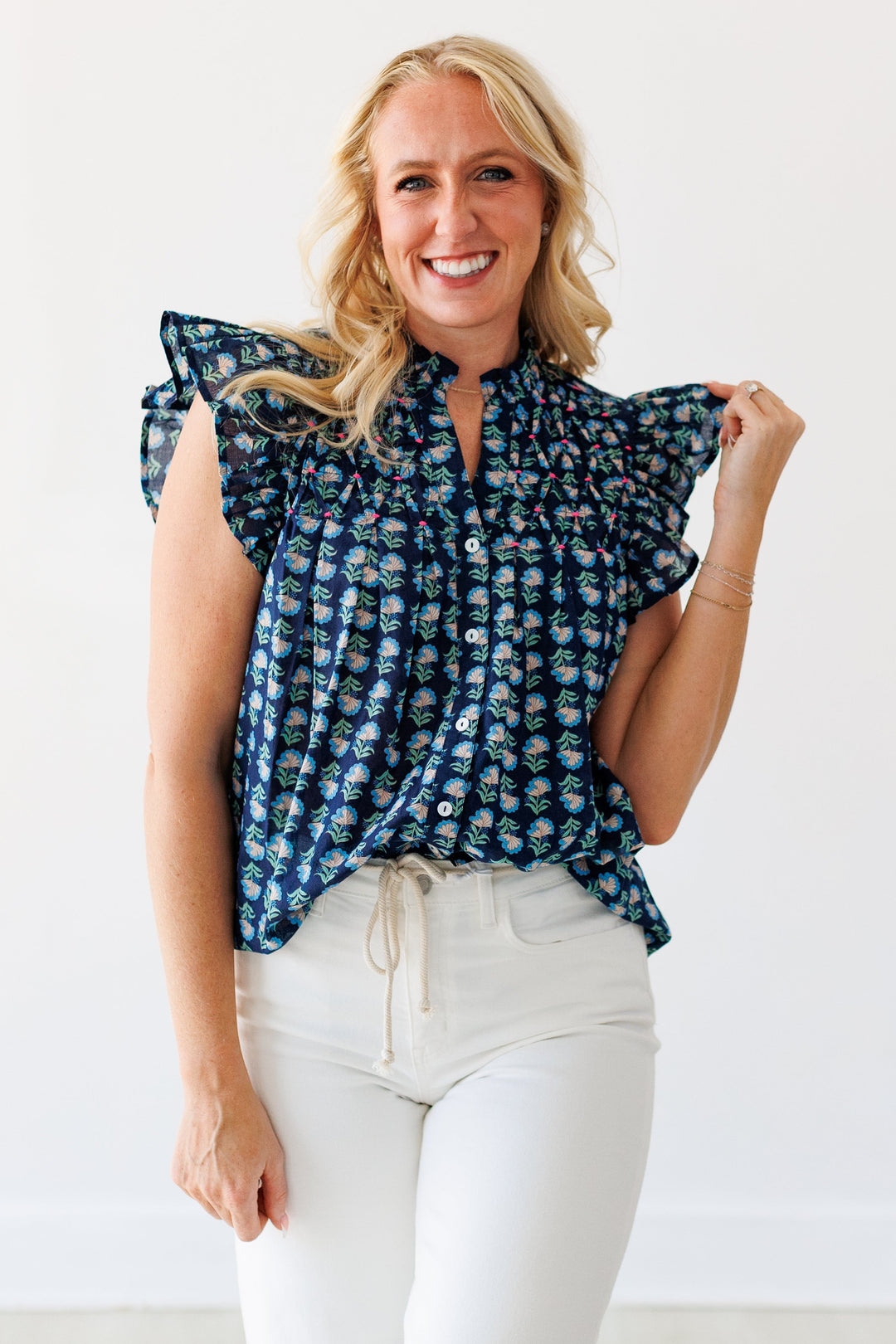 NAVY FLORAL FLUTTER BLOUSE