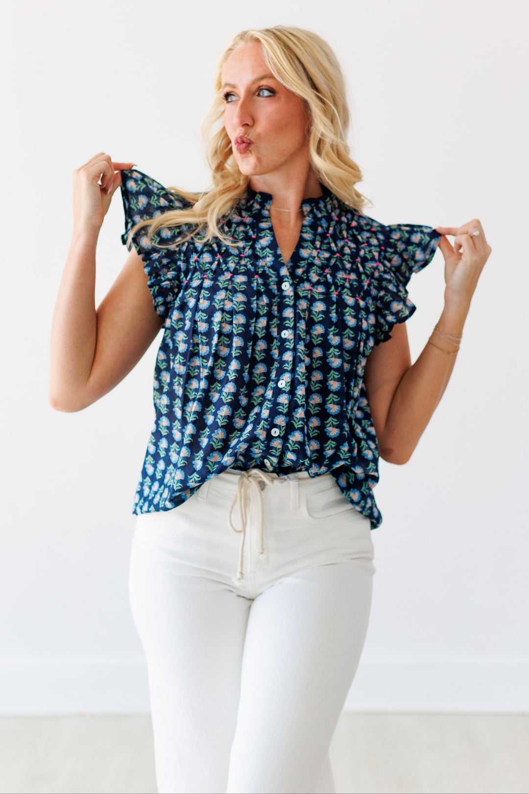 NAVY FLORAL FLUTTER BLOUSE