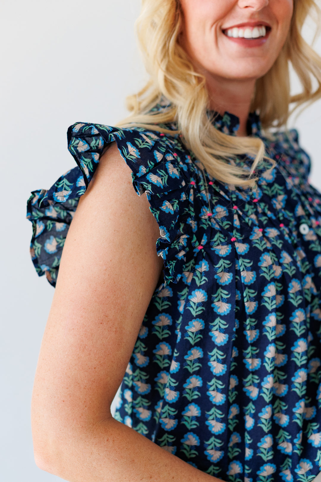 NAVY FLORAL FLUTTER BLOUSE