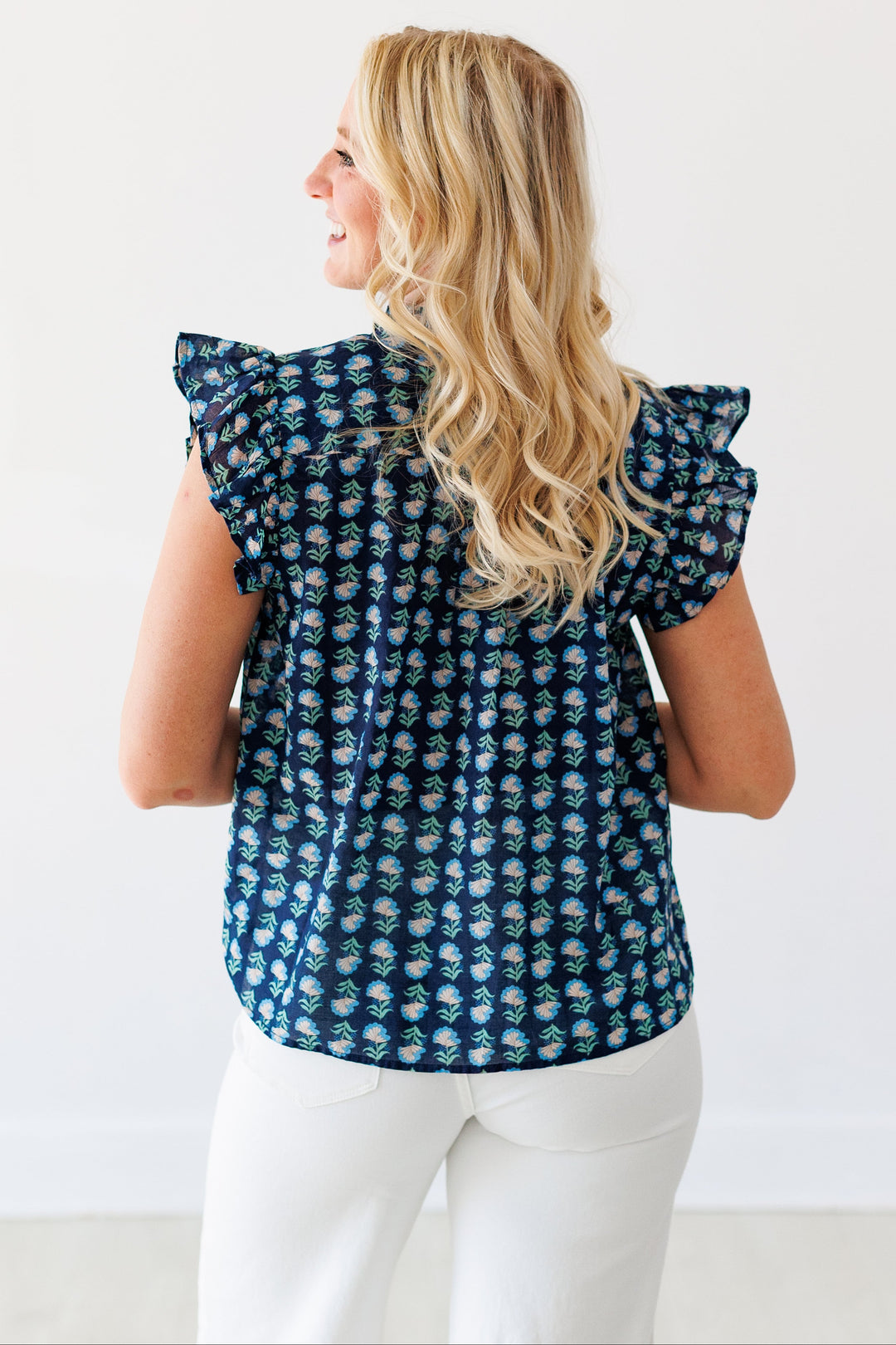 NAVY FLORAL FLUTTER BLOUSE