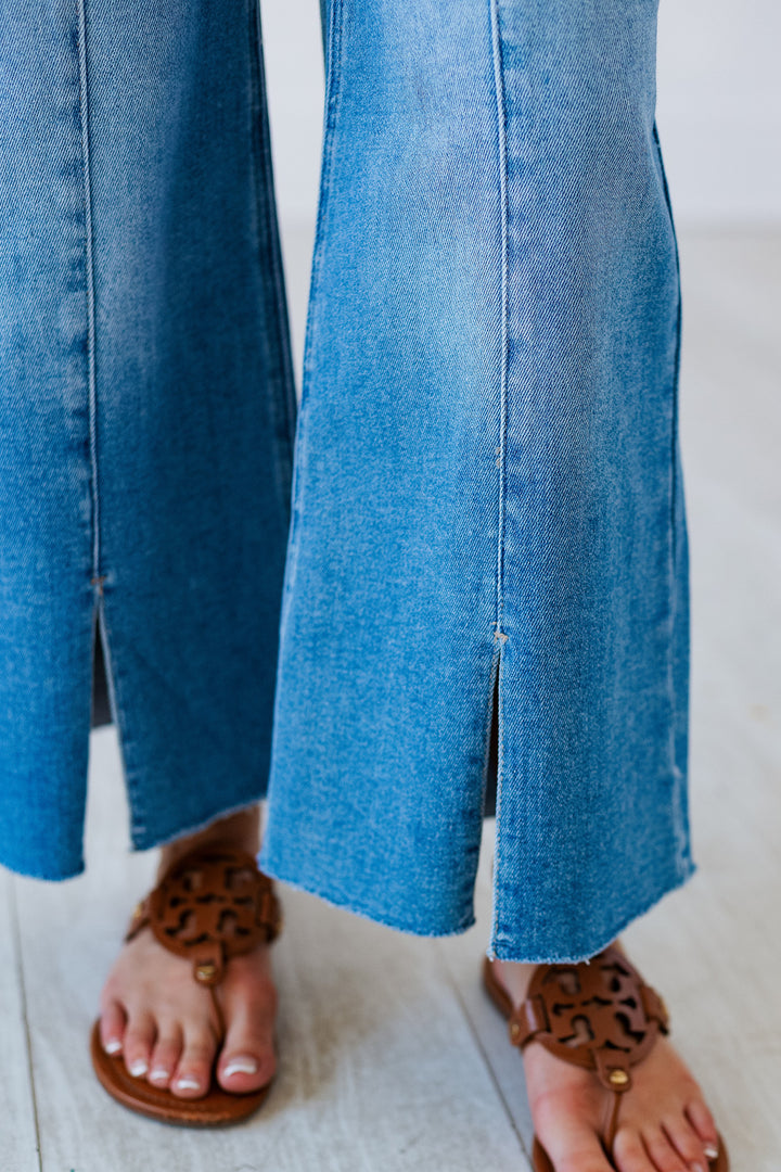 RISEN: MEDIUM DENIM FRONT SLIT JEAN