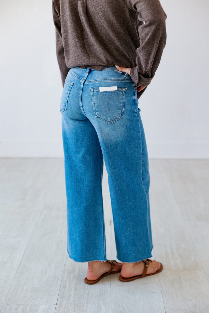 RISEN: MEDIUM DENIM FRONT SLIT JEAN