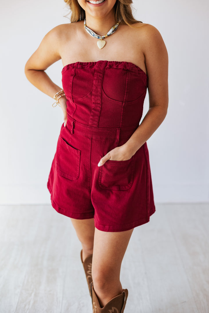 STRAPLESS DENIM ROMPER: GARNET RED