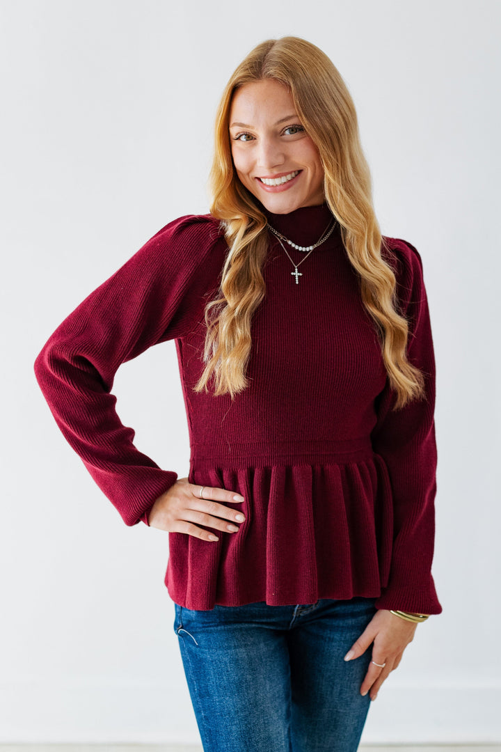 BURGUNDY PEPLUM HEM SWEATER
