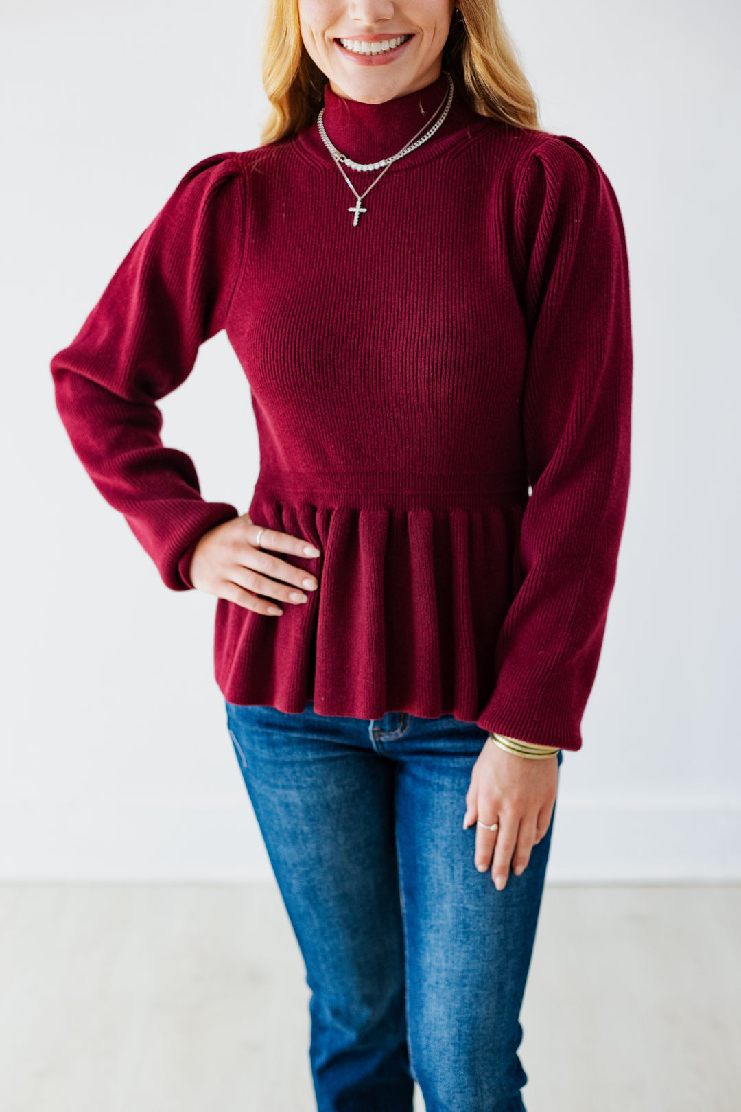 BURGUNDY PEPLUM HEM SWEATER