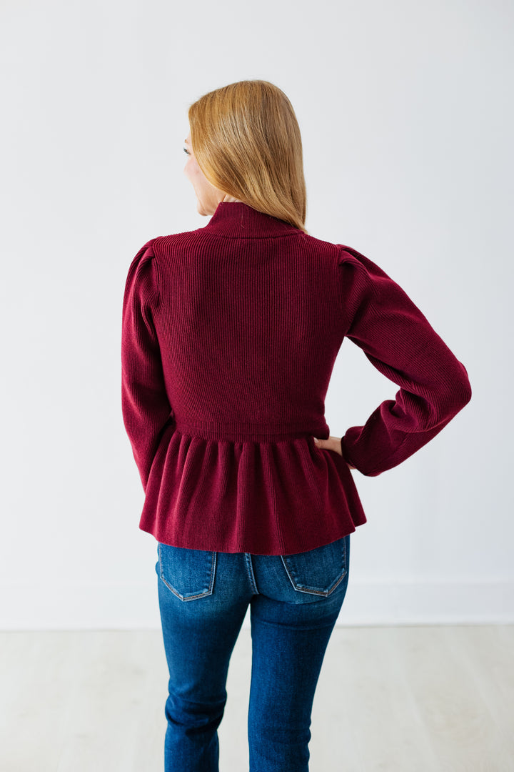 BURGUNDY PEPLUM HEM SWEATER