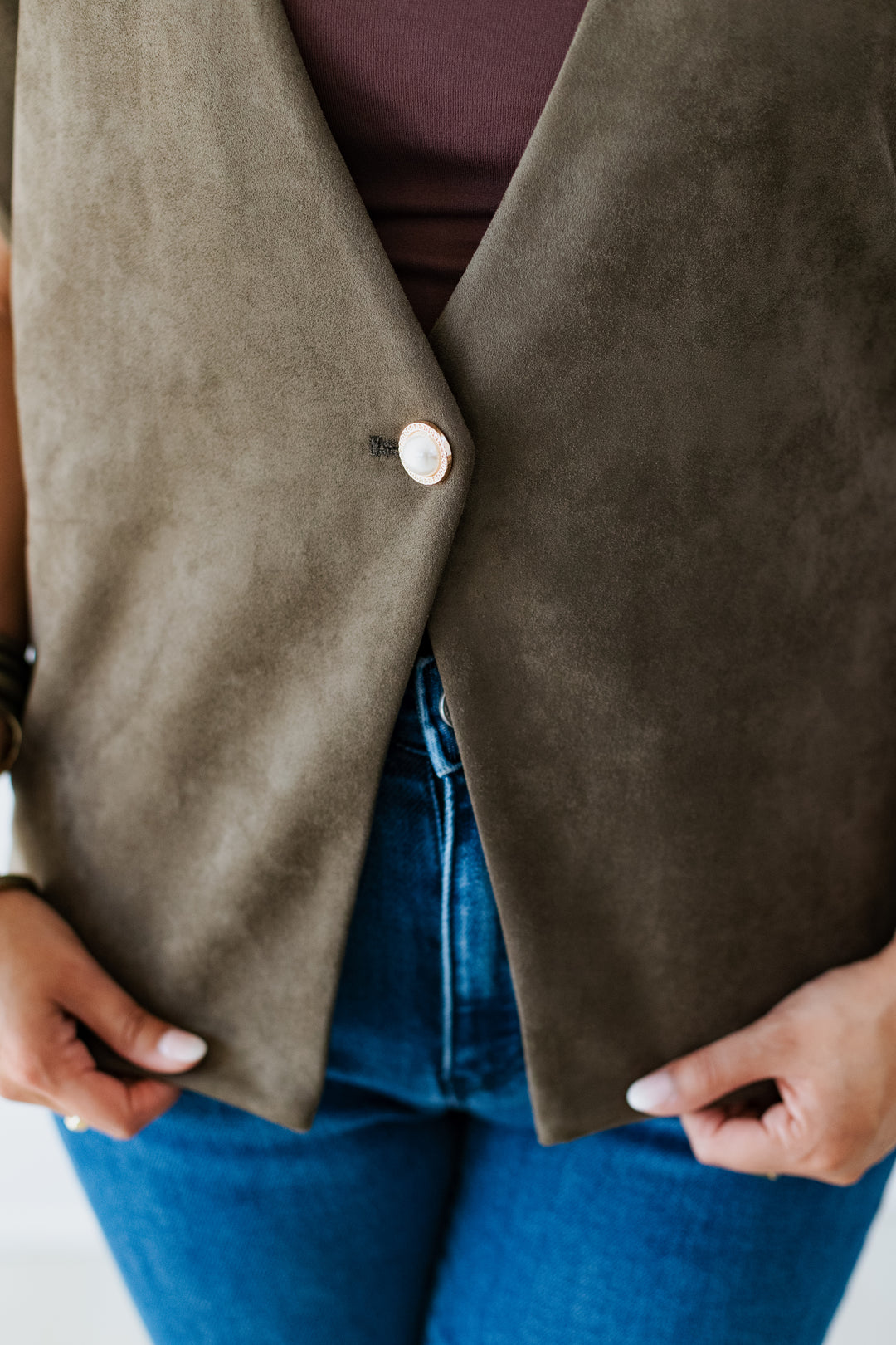 OLIVE SUEDE VEST WITH PEARL BUTTON