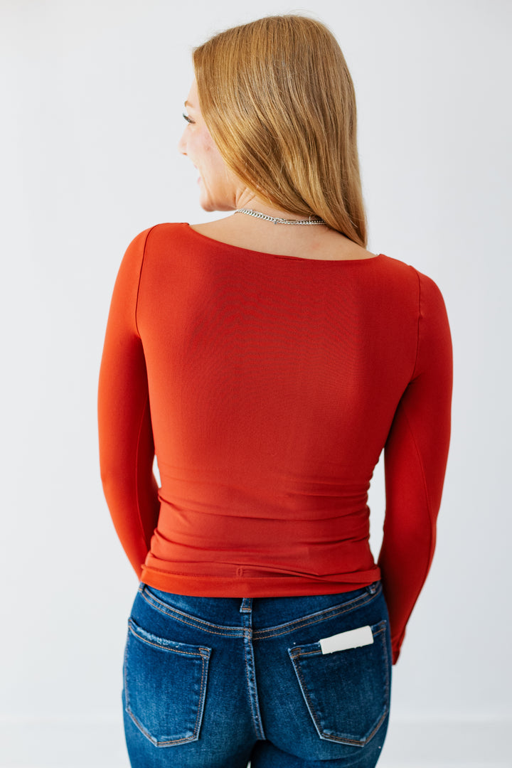 NIKIBIKI: CLEAN LINE LONGSLEEVE TOP- CHILI OIL