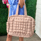 TAN QUILTED PUFFER DUFFEL BAG