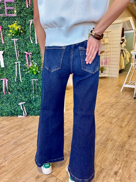 RISEN: DARK DENIM CORDUROY TEXTURE WIDE LEG JEAN