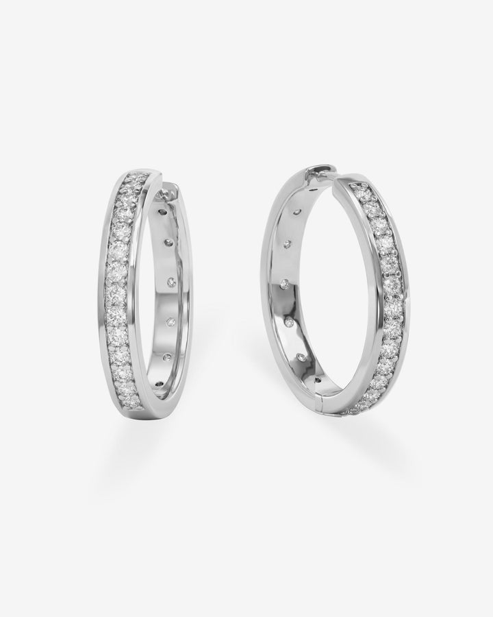 MELINDA MARIA: ASHLEY INFINITY REVERSIBLE 1" HOOPS- SILVER